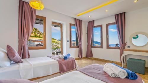 Ένα ή περισσότερα κρεβάτια σε δωμάτιο στο Villa Royal Hills 2