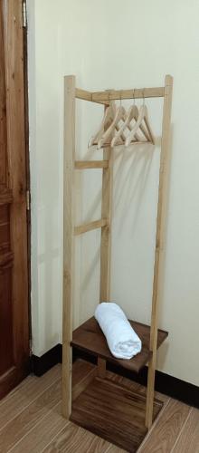 a wooden bunk bed in a room at Elisha's Guest House in Coron