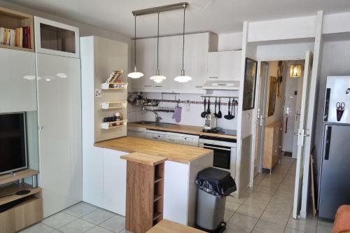 Kuchyňa alebo kuchynka v ubytovaní Naturiste Cap d'Agde Natura Beach 107