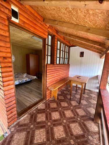 Ένα ή περισσότερα κρεβάτια σε δωμάτιο στο Cabana Tinca