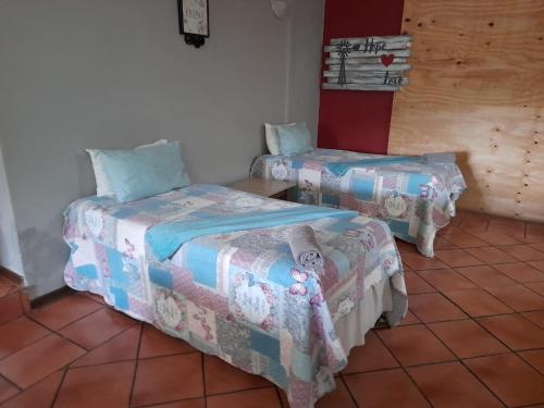 Postel nebo postele na pokoji v ubytování Platberg Self-catering