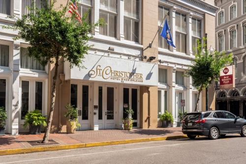 a car parked in front of a building at Best Western Plus St. Christopher Hotel in New Orleans