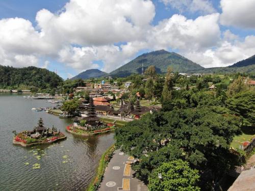 a view of a river with boats in the water at Villa Jado 3 - Lake and Mountain View Villa in Bedugul