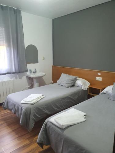 Postel nebo postele na pokoji v ubytování A Concha