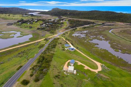 an aerial view of a road next to a river at Otway Coastal Villas, 1 Bedroom villa. in Princetown