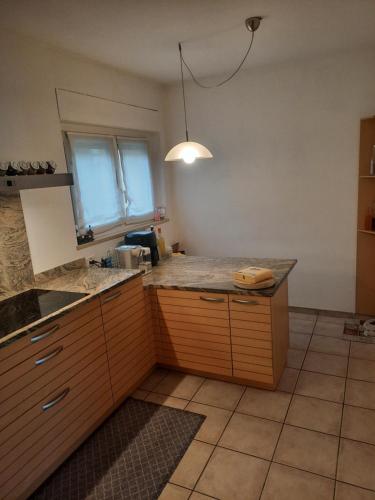 Kuchyň nebo kuchyňský kout v ubytování Camera privata con balcone