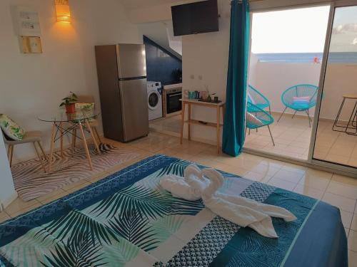 Gambar di galeri bagi Cibuqueira numéro 7, Centre ville, vue sur mer , plage à pied di Le Moule