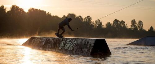 a man is on a ramp in the water at Ferienwohnung Hertreiter in Dingolfing 110qm in Dingolfing