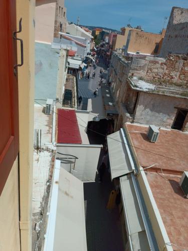 an overhead view of a city street with buildings at Imeros in Chania Town