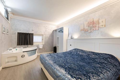 Postel nebo postele na pokoji v ubytování HOTEL Villa Lilla