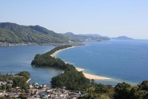 an aerial view of a beach in the water at Taikyourou in Miyazu