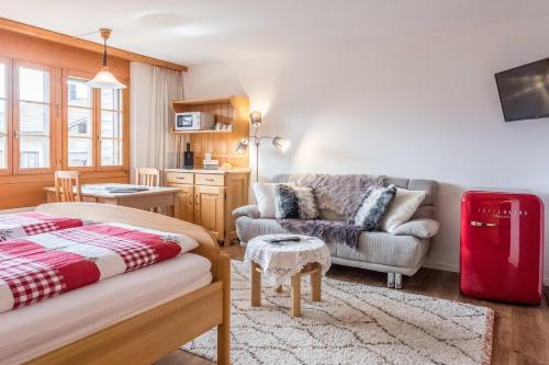 Postel nebo postele na pokoji v ubytování Studio Burgfeld - GRIWA RENT AG