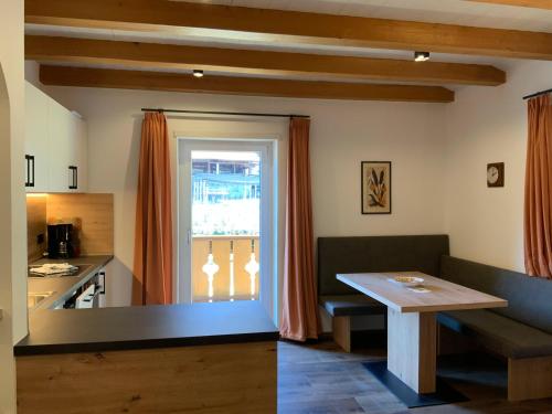 Kuchyň nebo kuchyňský kout v ubytování Garni & Residence Sonngart