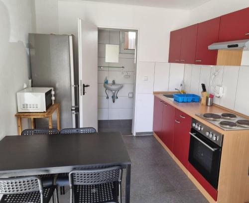 Η κουζίνα ή μικρή κουζίνα στο Boardinghouse Wendelstein