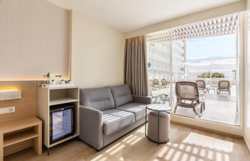 Coin salon dans l'établissement Hotel Samos