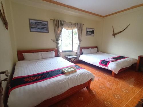 Ένα ή περισσότερα κρεβάτια σε δωμάτιο στο You hour homestay