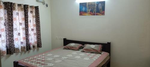 Postel nebo postele na pokoji v ubytování Beach Dreamz Villa 2 BHK Near Pondy and Auroville