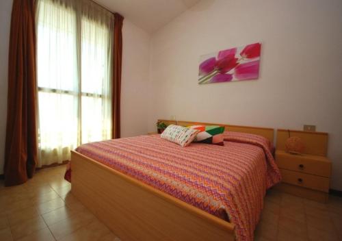 Ένα ή περισσότερα κρεβάτια σε δωμάτιο στο Residenza Olimpo