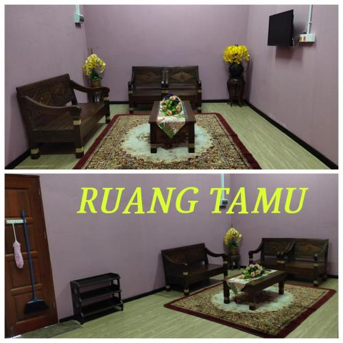 a living room with a couch and a coffee table at HOME STAY Tok Wan in Kampong Nail