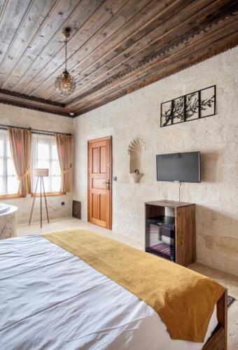 Uzay Cave Suite Hotelにあるベッド
