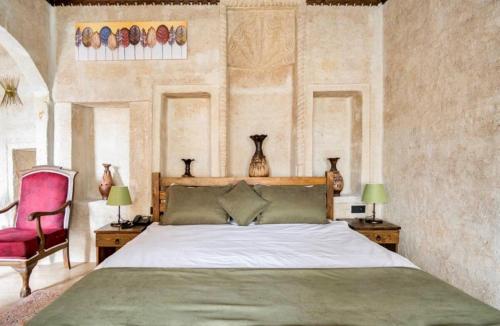 Uzay Cave Suite Hotelにあるベッド