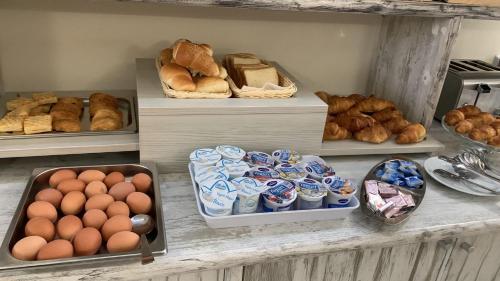 a bakery with bread and eggs and other baked goods at Kalaskiso' in Giardini Naxos