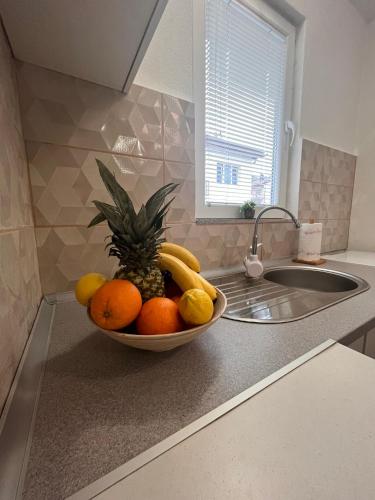 Η κουζίνα ή μικρή κουζίνα στο Vito apartments