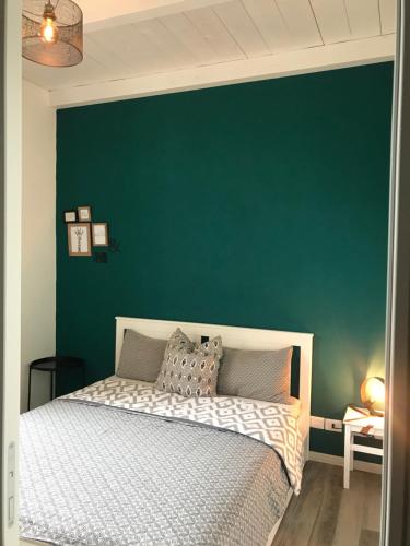 A bed or beds in a room at Mazzini apartment