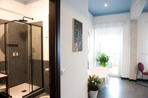 a bathroom with a shower and a sink at Le Terrazze del Duca San Pietro Guesthouse in Rome