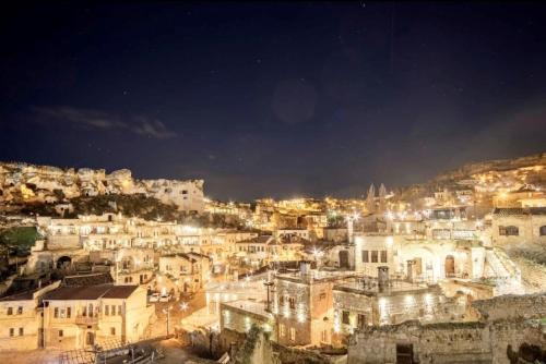 a view of a city at night at Uzay Cave Suite Hotel in Ürgüp
