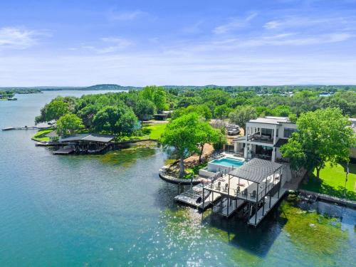 an aerial view of a house on the water at Highland Harmony New Listing Intro Pricing in Highland Haven