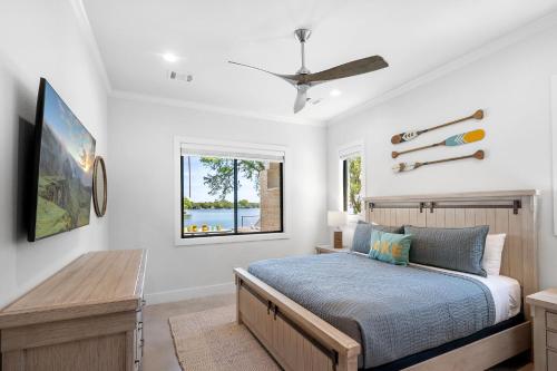 a bedroom with a bed and a window at Highland Harmony New Listing Intro Pricing in Highland Haven