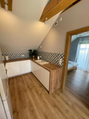 Virtuvė arba virtuvėlė apgyvendinimo įstaigoje Apartament_Zbąszyń