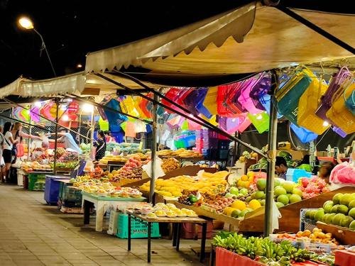 a market with a bunch of fruits and vegetables at Sea Hill Phatamnak Pattaya in Pattaya South