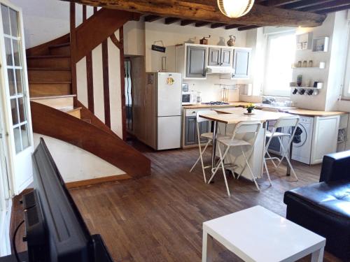 Köök või kööginurk majutusasutuses Les Berthaumes