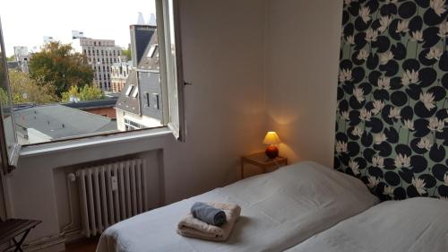 Кровать или кровати в номере Suite Liberte