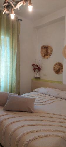 Postel nebo postele na pokoji v ubytování Liberato Puglia Vacanze