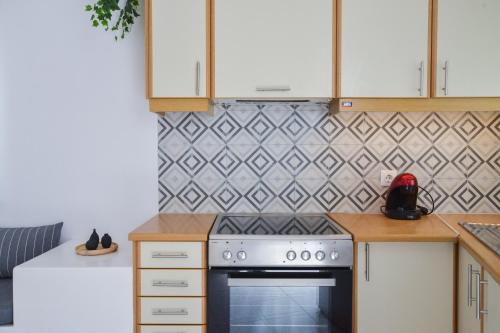 Dapur atau dapur kecil di Niki Rooms