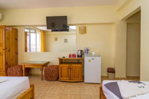 Η κουζίνα ή μικρή κουζίνα στο Fener Guest House