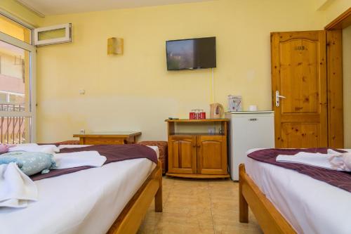 Ένα ή περισσότερα κρεβάτια σε δωμάτιο στο Fener Guest House