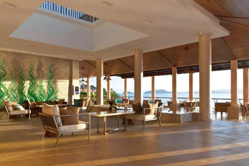 a lobby of a resort with chairs and tables at The Westin Siray Bay Resort & Spa, Phuket in Phuket
