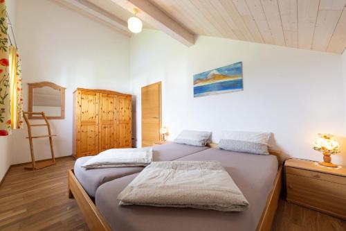 מיטה או מיטות בחדר ב-Eistobel und Felderhalde