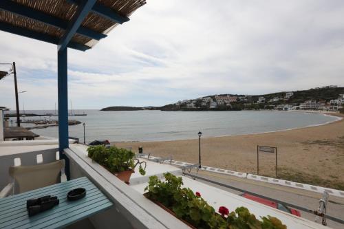 a view of the beach from the balcony of a house at Bella Vista in Batsi