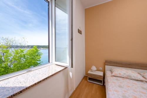 Posteľ alebo postele v izbe v ubytovaní Apartment Dobrić