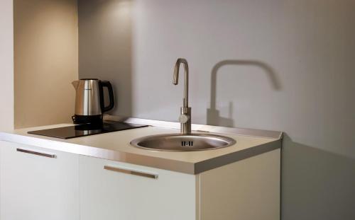 Η κουζίνα ή μικρή κουζίνα στο Casa del pittore - Elegante appartamento del 1200 - Centro storico Como