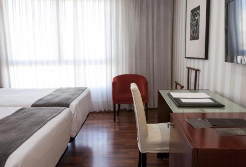 Postel nebo postele na pokoji v ubytování Hotel RH Murcia Centro
