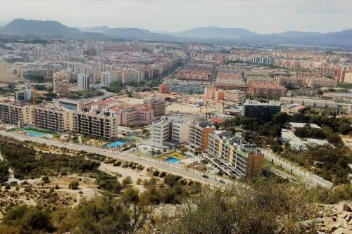 an aerial view of a city with a bridge at Modern flat at Garbinet with WiFi in Alicante