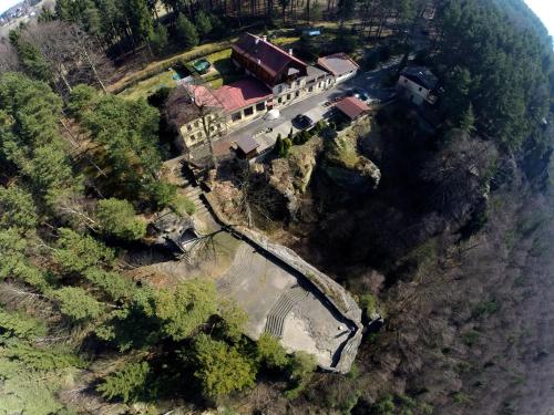 an aerial view of a house on a mountain at Hotel Garni Belveder in Hřensko