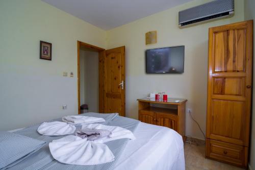 Ένα ή περισσότερα κρεβάτια σε δωμάτιο στο Fener Guest House