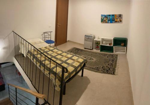 Ein Bett oder Betten in einem Zimmer der Unterkunft CASA NEL CENTRO DI FOLIGNO
